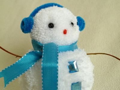 snowman christmas crafts - blue pom pom snowman close up