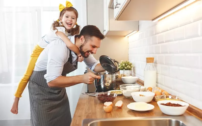 happy birthday dad cooking with daughter piggyback